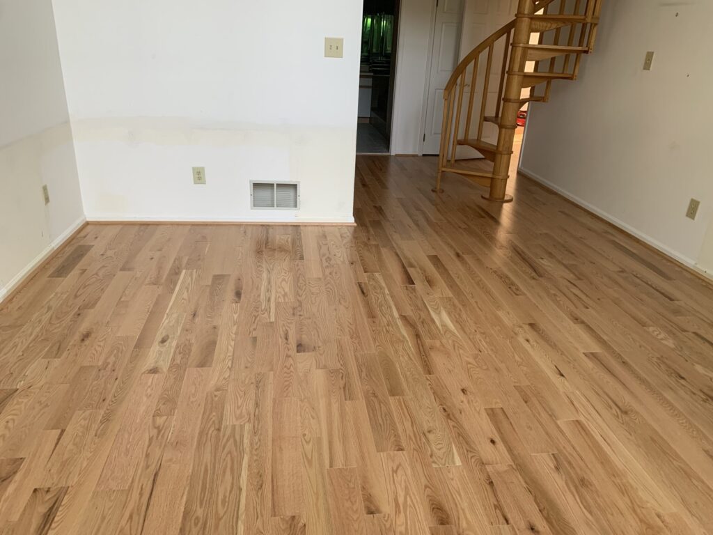 Multi-room hardwood floor installation
